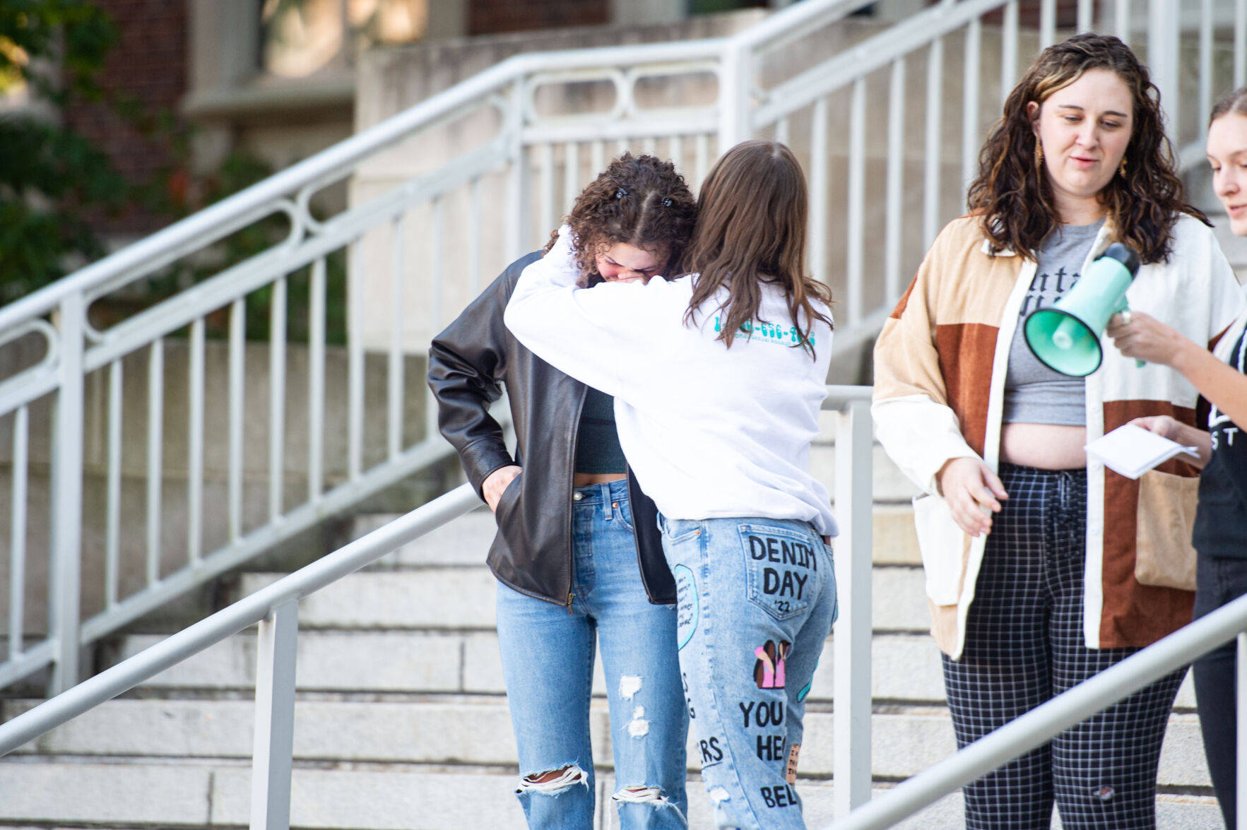 Students rally in support of MeToo movement, Grace Cochnauer comforts Beth Kelley